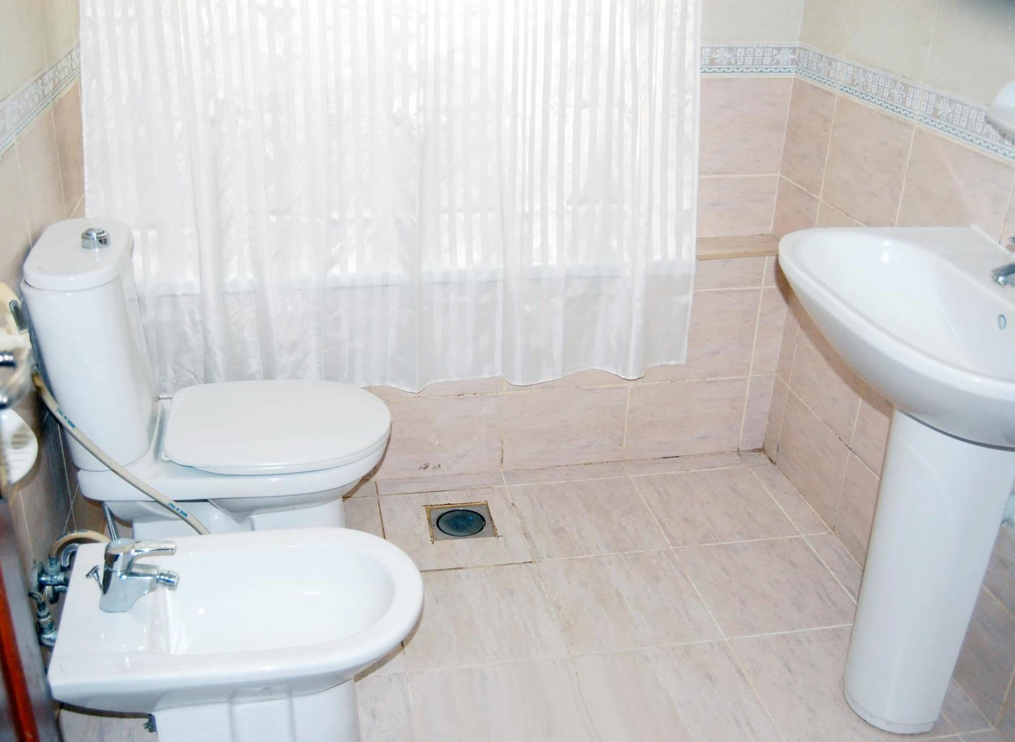Al Ferdous Hotel Apartment Шарджа Экстерьер фото