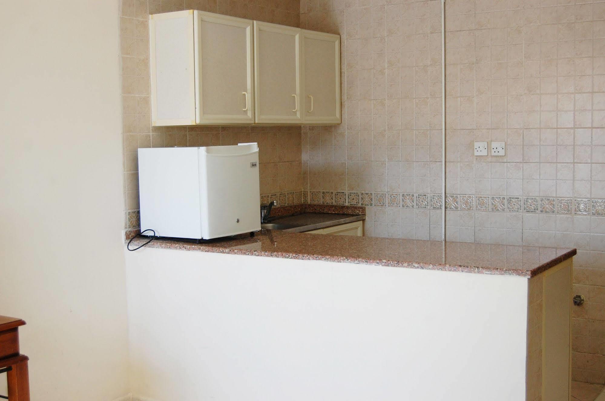 Al Ferdous Hotel Apartment Шарджа Экстерьер фото